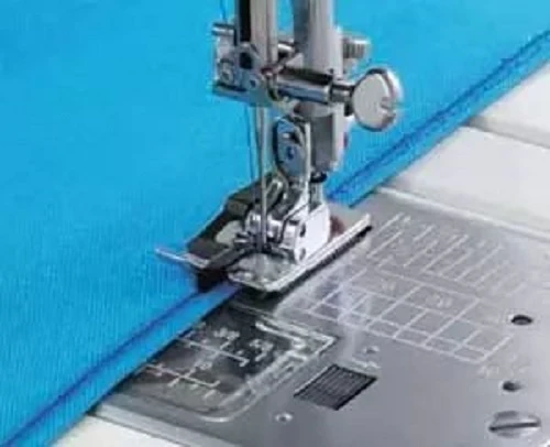 Use the blind sewing presser foot for cutting the hem